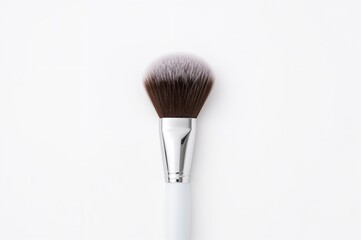 Makeup brush on a plain white backdrop symbolizing skincare ideas