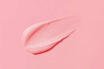 Color correction pink peach cream sample, makeup primer swatch on surface. Beauty lotion smear, moisturizer swipe close-up. Rich skincare cream product.