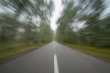 Fototapeta premium Abstract background of a blurred and out-of-focus roadway