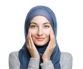 Serene muslim woman applying face cream skincare routine for healthy skin and beauty treatment with hijab in studio portrait showcasing radiant complexion with gentle touch