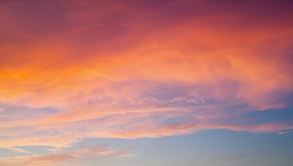Fototapeta premium Colorful sky backdrop showcasing a natural display of changing hues like orange, red, yellow, pink, and blue depending on the weather