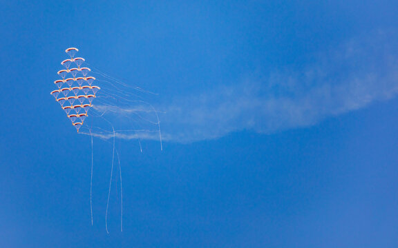Qatari paratroopers perform during Qatar National Day celebrations in Doha on 18th of December &ndash; stock photo.