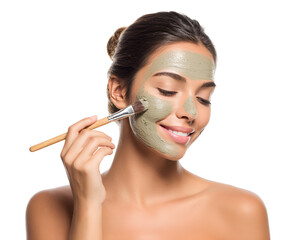 Smiling woman applying facial mask with brush for skin care treatment and wellness ritual natural cosmetic concept for healthy complexion and radiance therapeutic spa experience