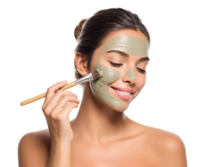 Smiling woman applying facial mask with brush for skin care treatment and wellness ritual natural cosmetic concept for healthy complexion and radiance therapeutic spa experience