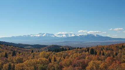 Fototapeta premium Stunning wide view of a sunny landscape featuring hills and an autumn meadow