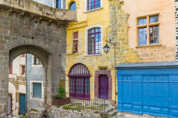 Colorful house at the Porte Saint-Georges gate in Le Puy-en-Velay, France