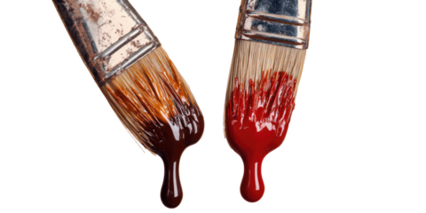 Two paintbrushes dripping with dark red and brown paint