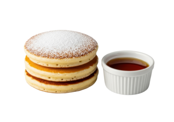 Stack of three golden-brown fluffy pancakes with powdered sugar, alongside a white ramekin of amber maple syrup, isolated on transparent, close-up, bright studio light, concept of culinary perfection