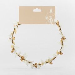 Elegant christmas headband crown with white and gold leaves and berries