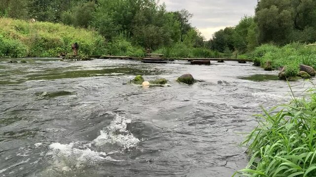 Fast current on the river with sound.