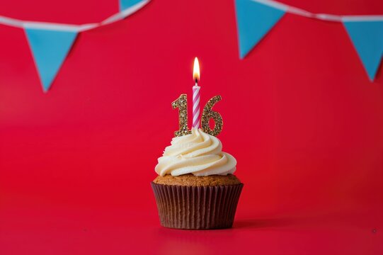 Cupcake celebrating a 116th birthday with candle, decorated with blue flags on a red background