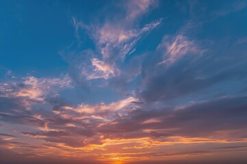 Fototapeta premium Sunset with vibrant blue and orange hues in the sky