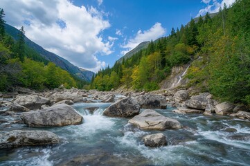 Rapidly moving river water rushing over rocky terrain beneath a clear blue sky