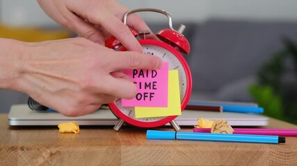 Paid Time Off Reminder: A Conceptual Image Featuring an Red Alarm Clock and a Note - Powered by Adobe