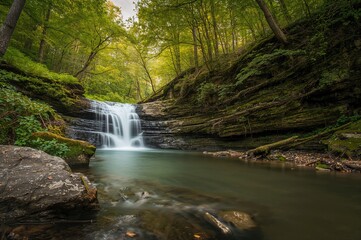 Naklejka premium Extended exposure showing a part of the cascade at the terminus of a creek.