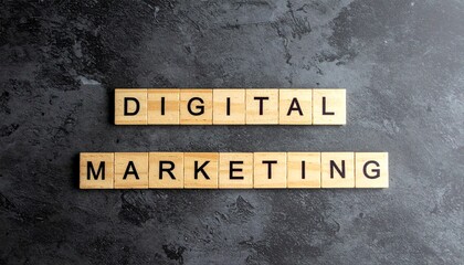 Obraz premium Wooden tiles spelling out the words Digital Marketing on a dark slate background, symbolizing online business strategy and internet promotion
