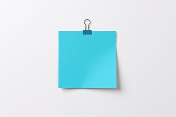 Pile of blue and white labels held by a metal clip, perfect for your note.