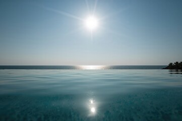 Obraz premium Reflection of a lamp shimmering over a pool with water and sky in the background during summer travel