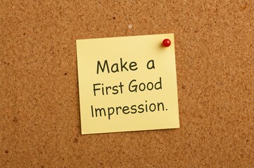 Pinned recycled paper note on a corkboard - conceptual image