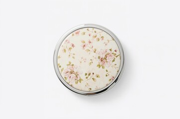 Charming compact mirror adorned with delicate floral patterns. Professional accessory photography on a white backdrop