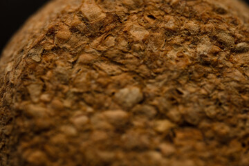 A close up of surface with a grainy texture