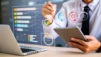 Professional analyzing data on a futuristic transparent screen with laptop and tablet, focusing on business intelligence and strategic planning