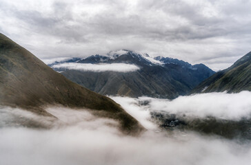 Scenic dramatic landscape of the Andes Mountains captured from the Chicaqata Hike leading to the Inti Punku Sun Gate near Ollantaytambo, Peru.