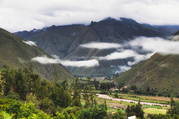 Scenic dramatic landscape of the Andes Mountains captured from the Chicaqata Hike leading to the Inti Punku Sun Gate near Ollantaytambo, Peru.