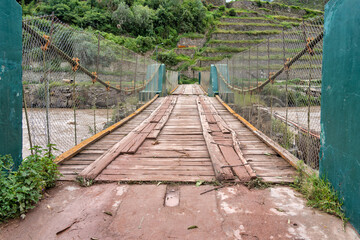 View of the Puente Inca ( Inca bridge) over the Urubamba River in Ollantaytambo, Sacred Valley of Peru