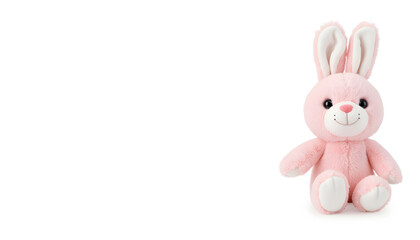 Obraz premium Pink stuffed bunny toy sitting on white background 