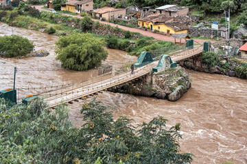 View of the Puente Inca ( Inca bridge) over the Urubamba River in Ollantaytambo, Sacred Valley of Peru