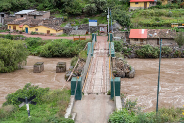 View of the Puente Inca ( Inca bridge) over the Urubamba River in Ollantaytambo, Sacred Valley of Peru