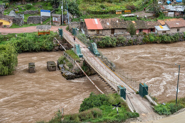 View of the Puente Inca ( Inca bridge) over the Urubamba River in Ollantaytambo, Sacred Valley of Peru