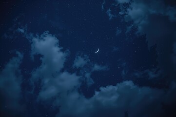 Dark blue night sky filled with clouds, stars, and a crescent moon