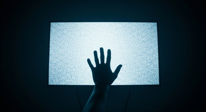Silhouette of a Hand Reaching for a Static TV Screen - Powered by Adobe
