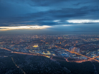 Urban landscape with numerous buildings, trees and residential areas