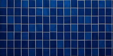 Deep navy blue ceramic tiles form a geometric background pattern,  building material,  wall