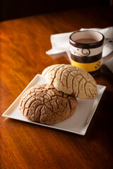 Conchas. Mexican sweet bread roll with seashell-like appearance, Usually eaten with coffee or hot chocolate at breakfast or as an afternoon snack.