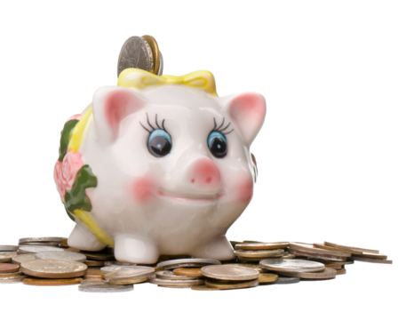Piggy bank resting on pile of coins with transparent background