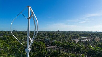 vertical wind turbine on farming area