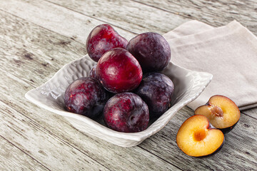Ripe sweet juicy plum heap