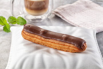 Gourmet chocolate eclair with icing
