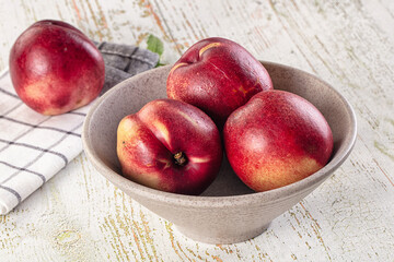 Ripe sweet juicy nectarines heap