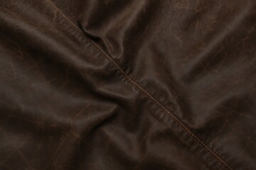 Fototapeta premium Macro Shot of Dark Brown Oilskin Fabric – Waxy Surface Detail