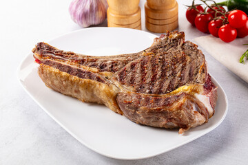 Grilled ribeye beef steak with bone