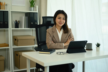 Corporate woman in office attire looking confident and approachable, suitable for business and leadership themes