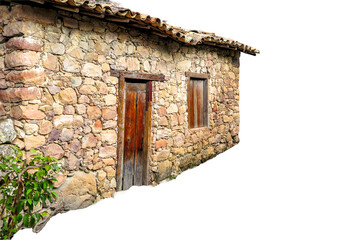 Rustic house made of exposed stone, with dark wood doors and windows, typical of the historic village of Igatu, Chapada Diamantina, Bahia. Isolated against a transparent background.