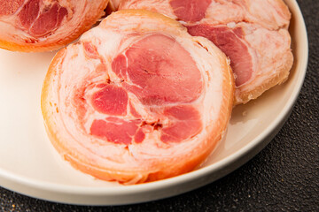 Ham hock with skin jambonneau cooked pork knuckle with rind tasty snack fresh delicious gourmet food background on the table rustic top view copy space