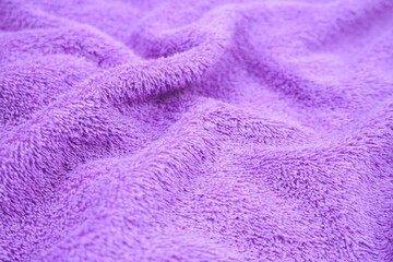 purple towel fabric texture background close up