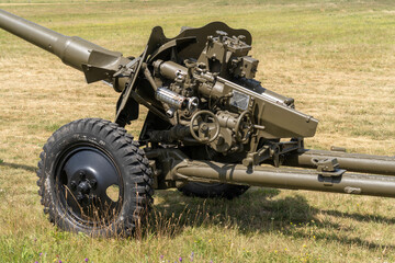 Old soviet divisional 85-mm calibre D44 field artillery gun on open grassland